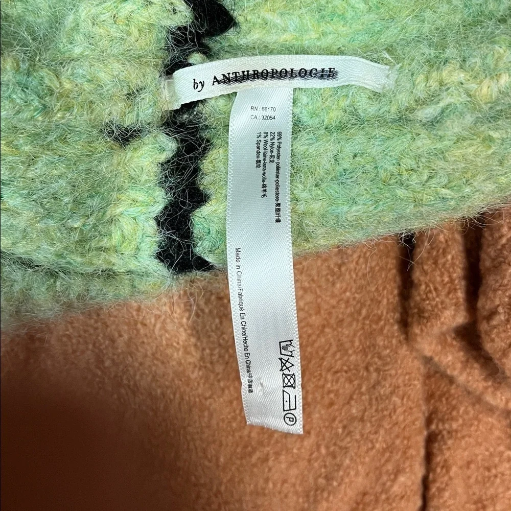 Anthropologie stylish cream